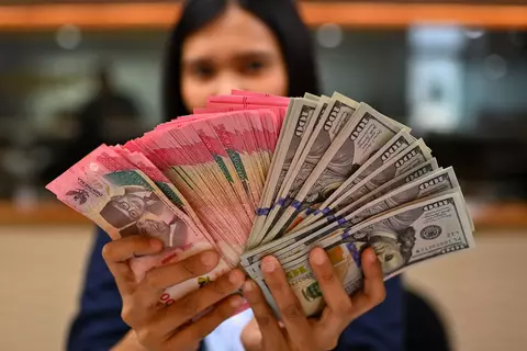 Rupiah Tembus Rp18.000, Tekanan Global Menguat